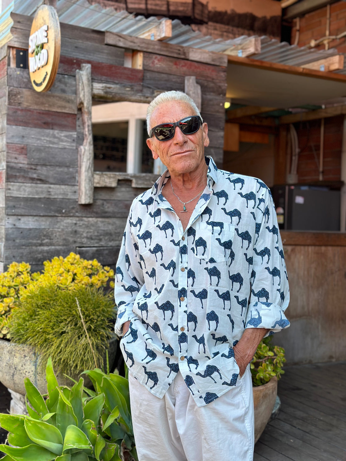 A.M.E. customer wearing a hand block printed shirt